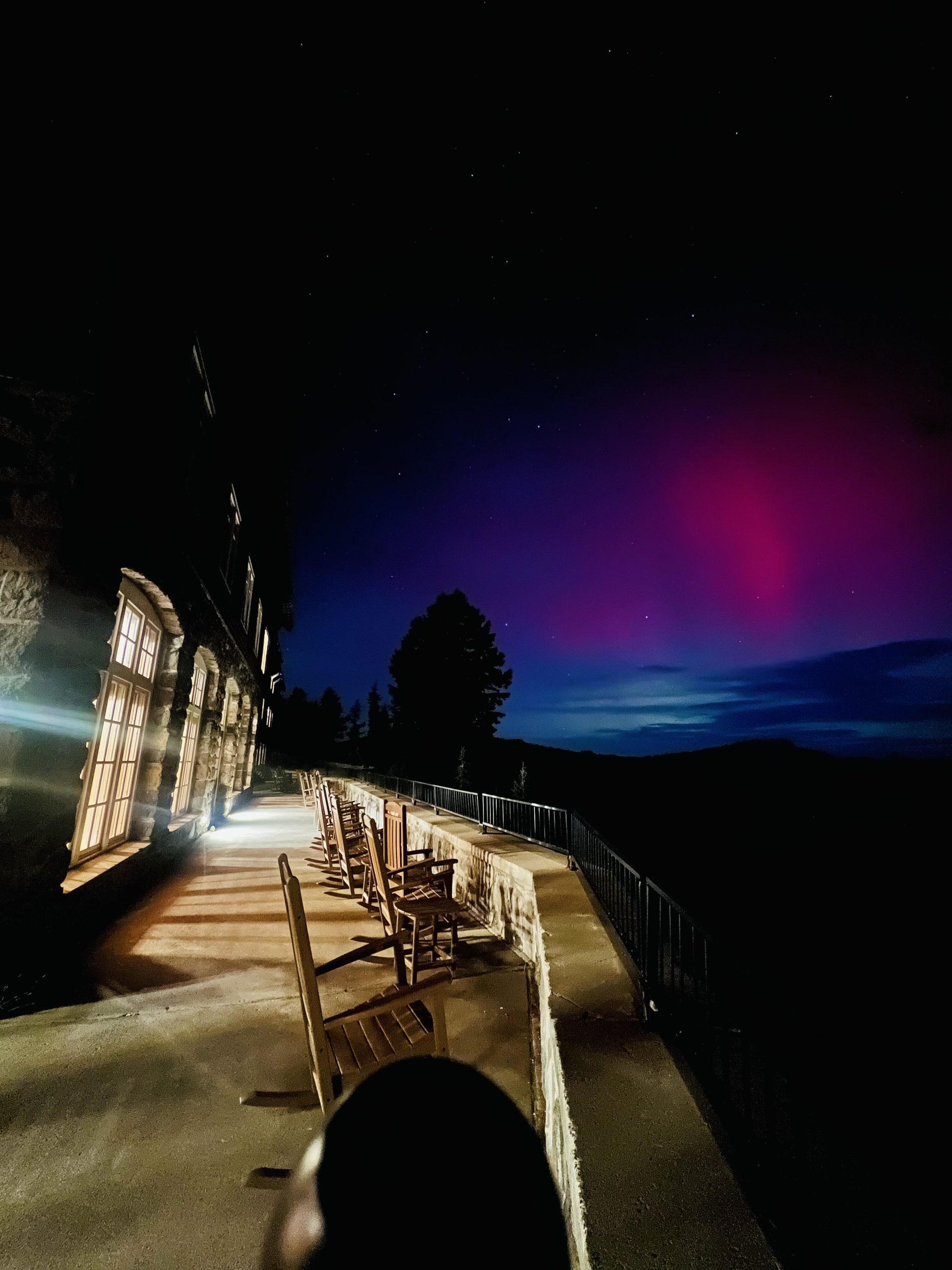 View of the northern lights from the back patio at Crater Lake Lodge