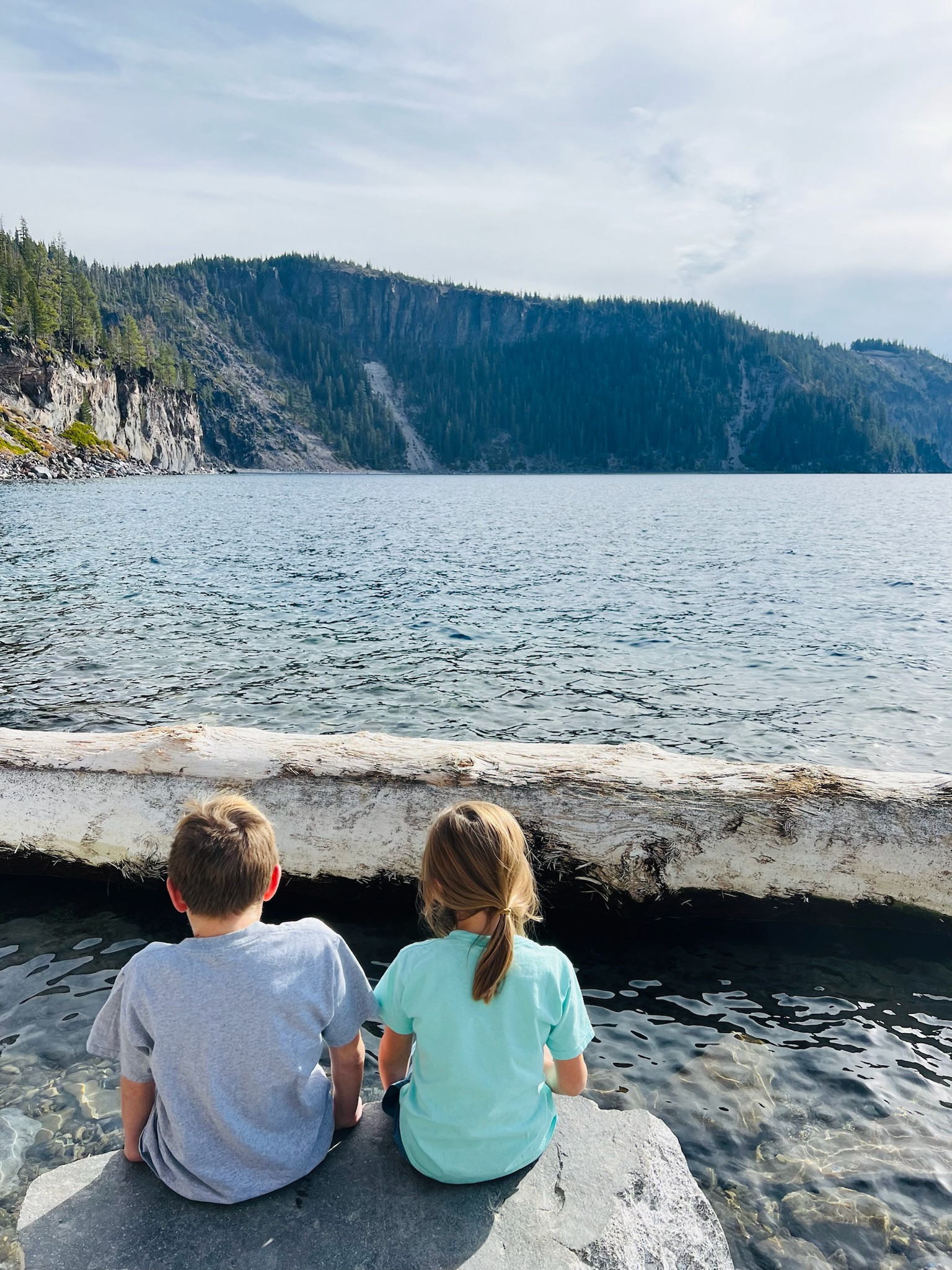 Overlooking the water at the edge of Crater Lake
