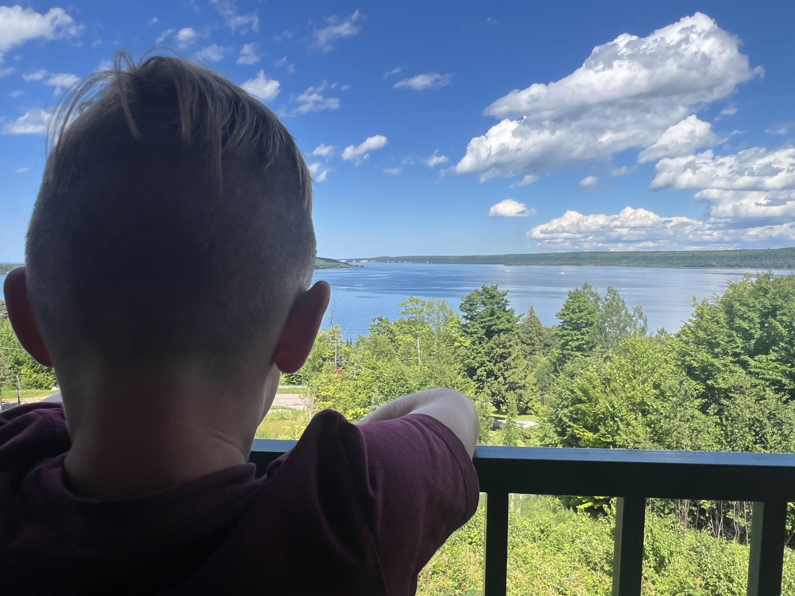 Boy looking out over Lake Superior