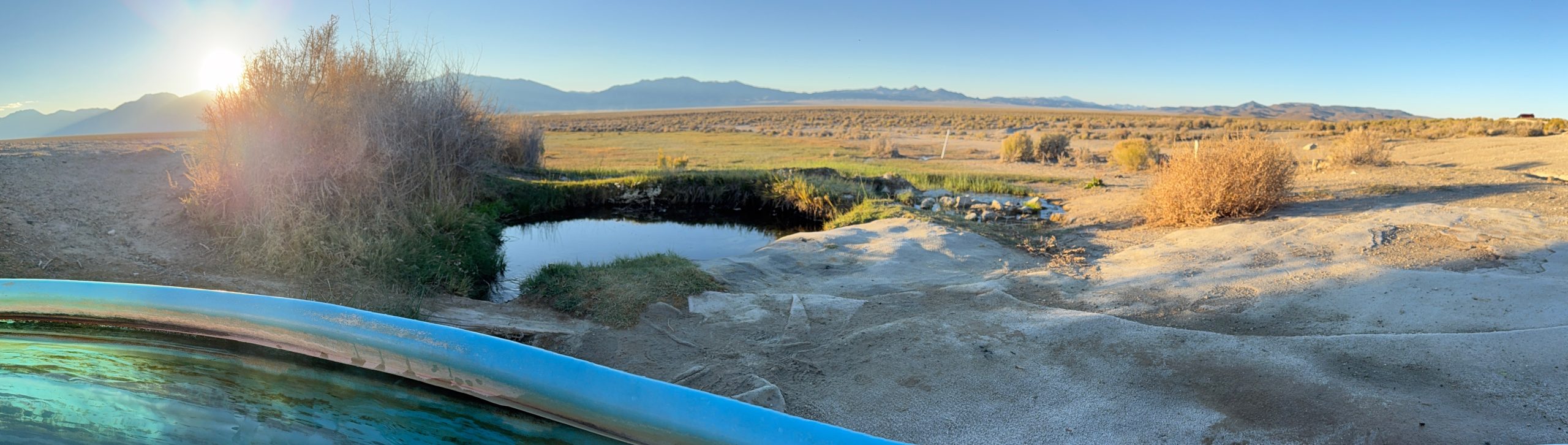 Overlooking a hot spring at Spencer Hot Springs along the Loneliest Road in America