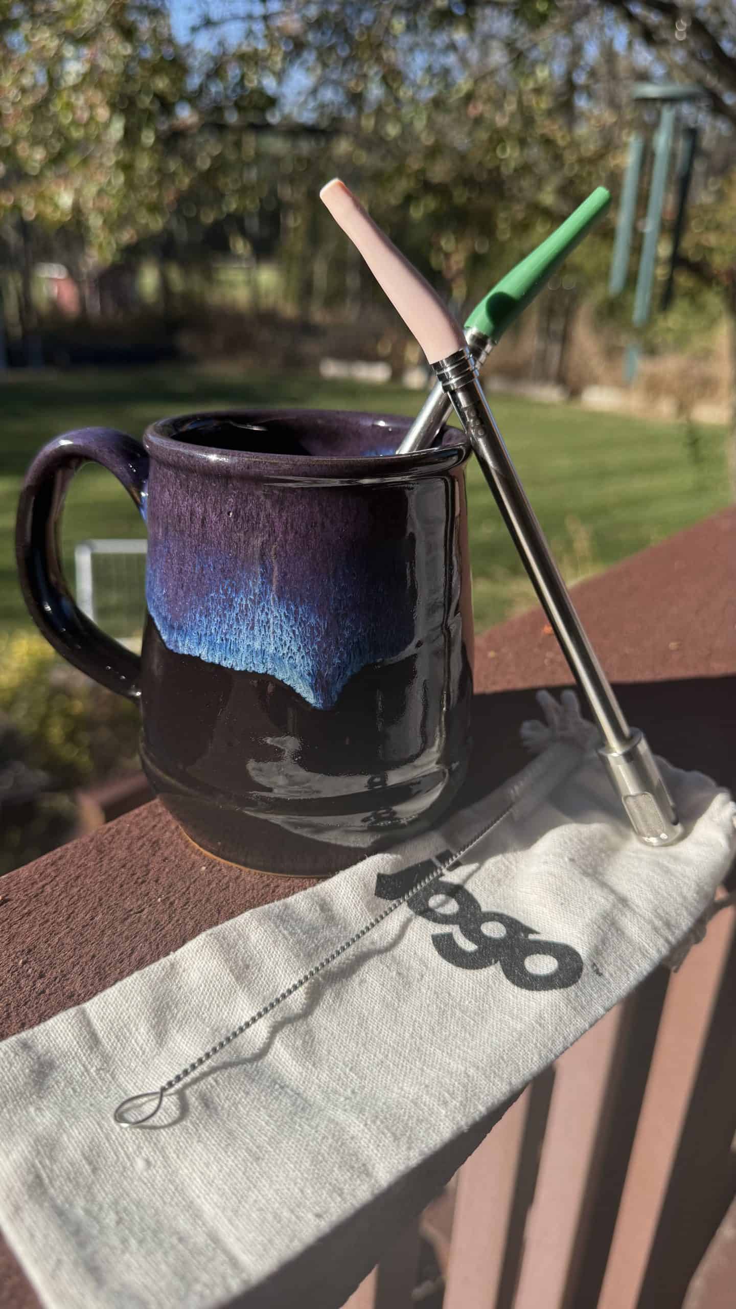 coffee mug with two JoGo coffee straws