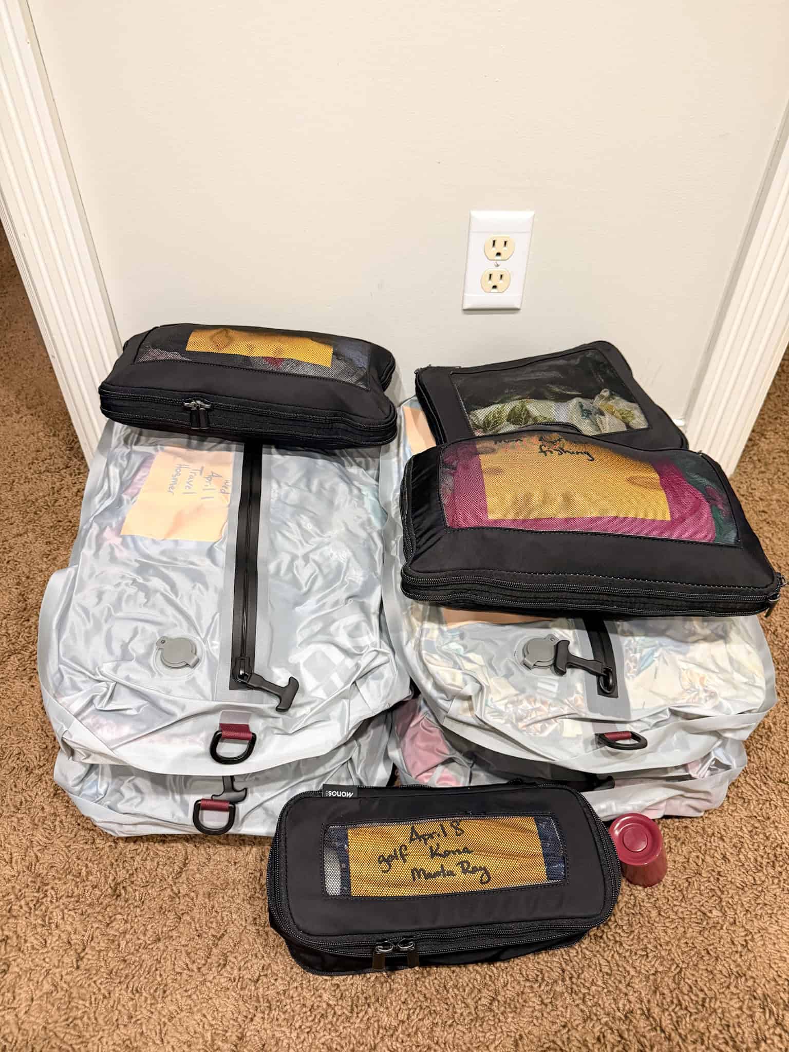 Complete family packing system with vacuum bags and packing cubes for 10-day national park trip
