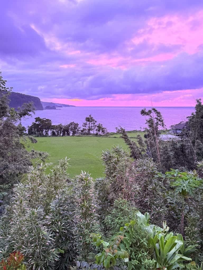Purple and pink sunset sky over the ocean viewed from Ke'anae Uka campground on the Road to Hāna